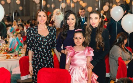 Prezidentin qızları və gəlini şəhid övladları ilə bayram şənliyində